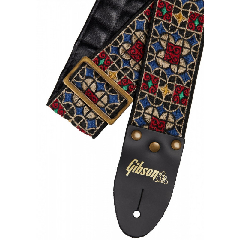 Pasek do gitary z wzorami i logo Gibson.